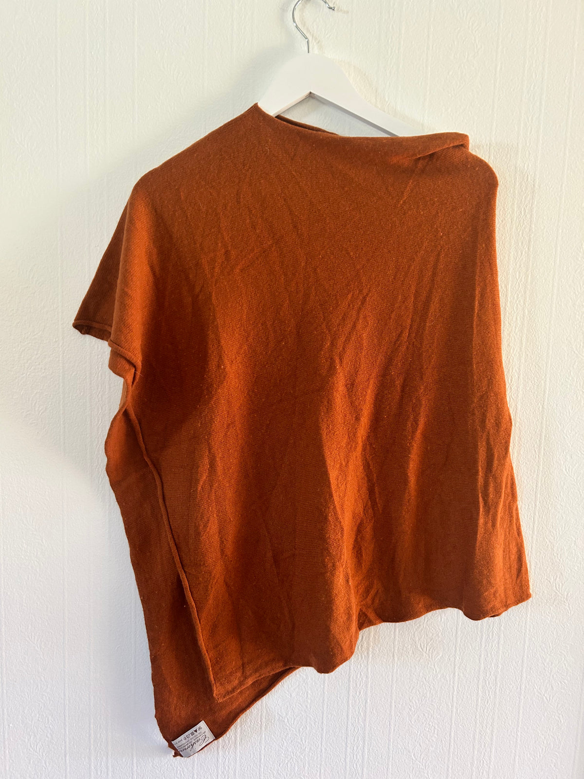 Oransje poncho i ull