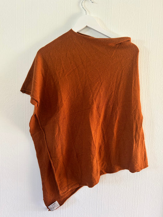 Oransje poncho i ull