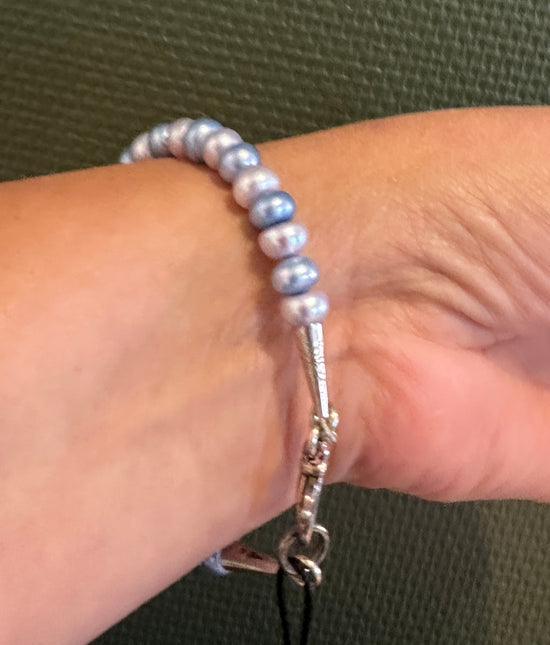 Armbånd med blå perler