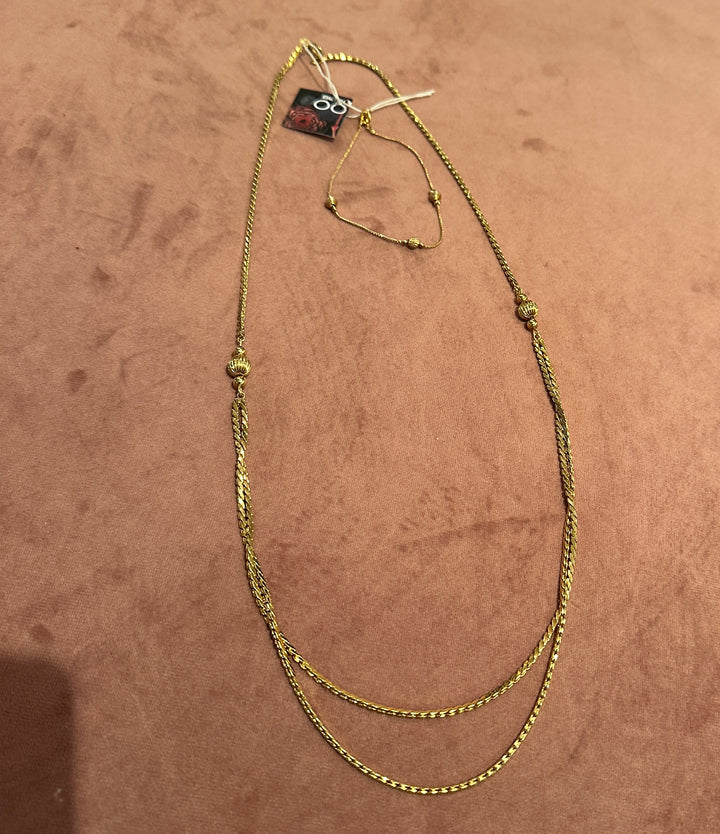 Smykkeset med halskjede og armbånd
