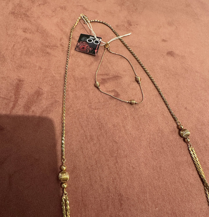 Smykkeset med halskjede og armbånd